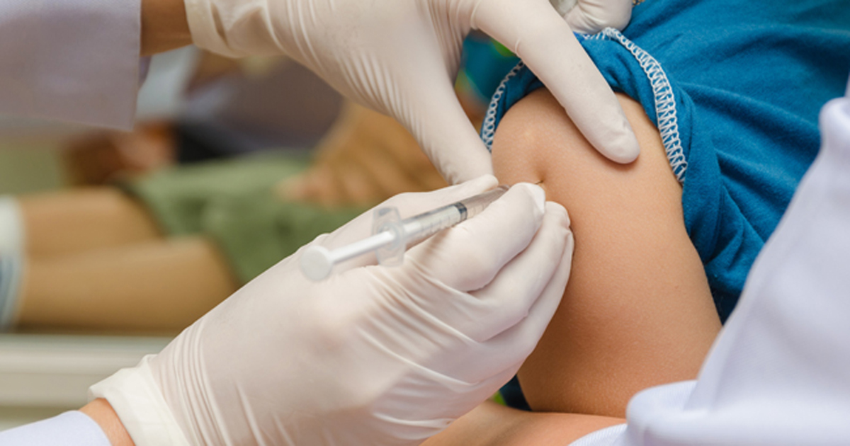 Child receiving vaccine